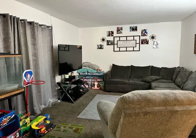 Photo 3 of Condo for sale at 5885 Dahlia Dr #24, Orlando, FL 32807 | MLS# O6273806 | Listing updated on 2026-08-13