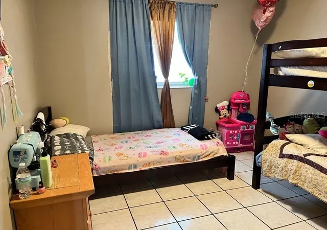 Listing Photo 5 - Condo for sale in building located at 5885 Dahlia Dr, Orlando, FL 32807 - Unit #31/116
