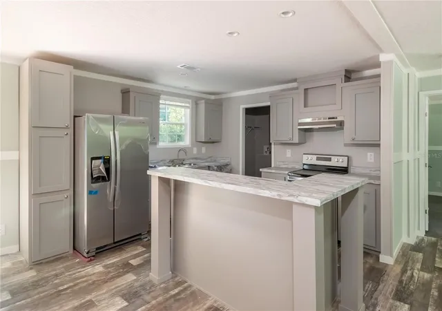 4th image of 1143 Se 159Th Ct, Silver Springs, FL 34488 | MLS# OM693761