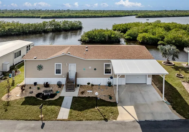 Photo 2 of Manufactured home for sale at 106 Is Point Rd, North Port, FL 34287 | MLS# N6136916 | Listing updated on 2026-08-04
