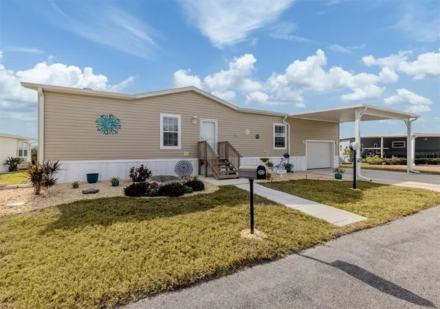 Photo 3 of Manufactured home for sale at 106 Is Point Rd, North Port, FL 34287 | MLS# N6136916 | Listing updated on 2026-08-04