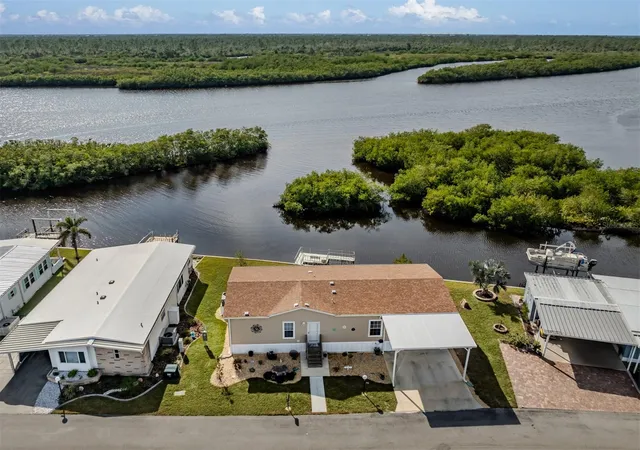 Photo 4 of Manufactured home for sale at 106 Is Point Rd, North Port, FL 34287 | MLS# N6136916 | Listing updated on 2026-08-04