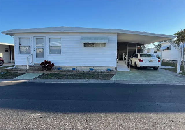 Photo 1 of Manufactured home for sale at 220 Royal Palm Cir, Largo, FL 33778 | MLS# TB8350080 | Listing updated on 2026-08-26