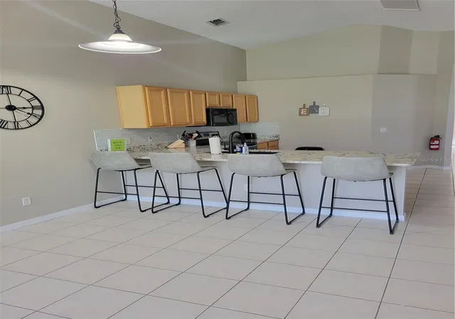 Photo 3 of Single family home for sale at 1310 Seasons Blvd, Kissimmee, FL 34746 | MLS# TB8350317 | Listing updated on 2026-08-25