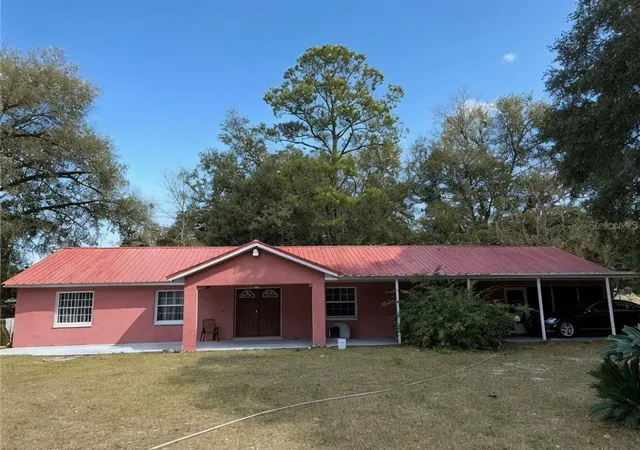 Photo 1 of Single family home for sale at 912 Ne 144th Court, Silver Springs, FL 34488 | MLS# S5120669 | Listing updated on 2026-09-21