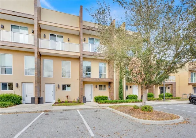 Photo 1 of Townhouse for sale at 7663 Recife Dr, Kissimmee, FL 34747 | MLS# O6281676 | Listing updated on 2026-08-07