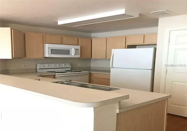 Photo 3 of Condo for sale at 2000 Erving Cir #102, Ocoee, FL 34761 | MLS# O6281704 | Listing updated on 2026-10-01