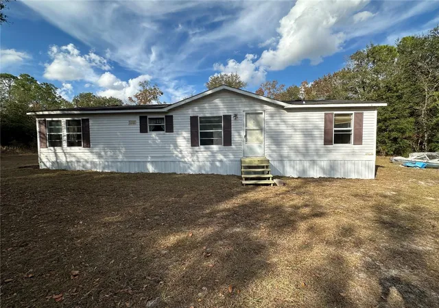 1st image of 28430 Sw 97th Ln, Newberry, FL 32669 | MLS# TB8351580
