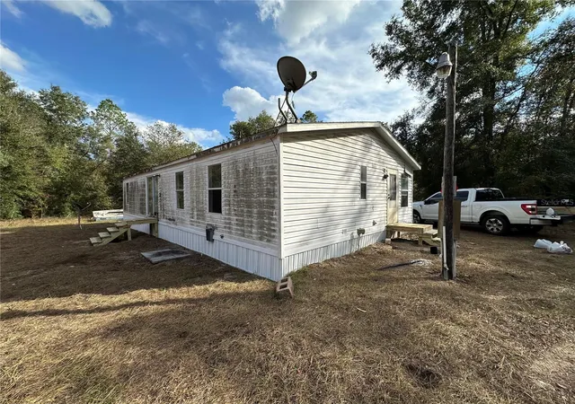 23rd image of 28430 Sw 97th Ln, Newberry, FL 32669 | MLS# TB8351580