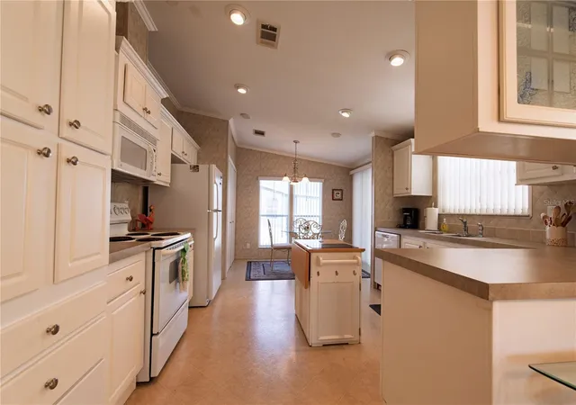 Photo 4 of Manufactured home for sale at 33 Amsterdam Ave, Punta Gorda, FL 33950 | MLS# C7505659 | Listing updated on 2026-08-22