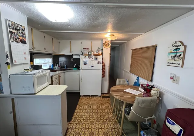 Photo 3 of Manufactured home for sale at 12674 Seminole Blvd #C30, Largo, FL 33778 | MLS# TB8359367 | Listing updated on 2026-07-20