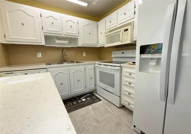 Photo 2 of Condo for sale at 11817 Bayonet Ln, New Port Richey, FL 34654 | MLS# W7873377 | Listing updated on 2026-10-14