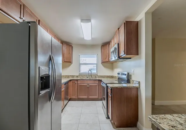 4th image of 4320 Meadowbrook Ave, Orlando, FL 32808 | MLS# O6290370