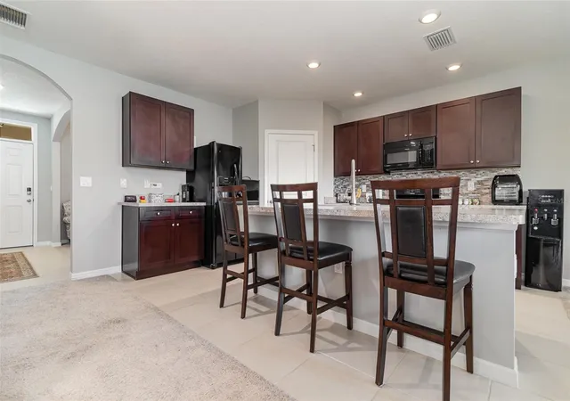 5th image of 9731 Pepper Tree Trl, Wildwood, FL 34785 | MLS# O6291630
