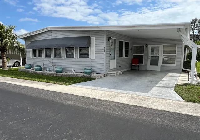Photo 2 of Manufactured home for sale at 709 Sugar Palm St, Largo, FL 33778 | MLS# TB8365261 | Listing updated on 2026-09-19