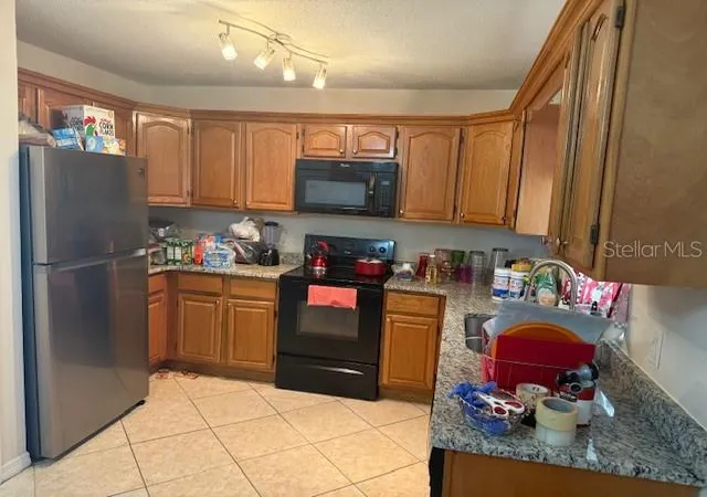 4th image of 2108 Wolf Rd, Orlando, FL 32808 | MLS# O6292851