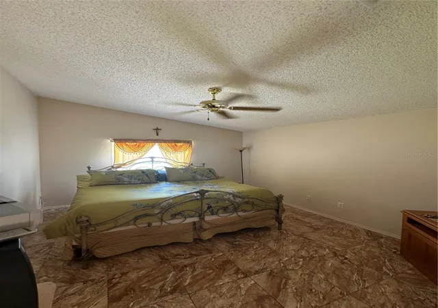 Photo 3 of Single family home for sale at 105 Cattail Ct, Kissimmee, FL 34743 | MLS# FC308382 | Listing updated on 2026-10-06