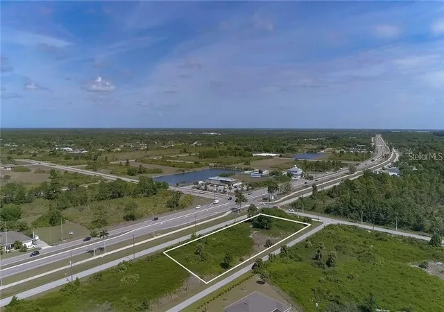 Photo 1 of Land for sale at 8420 Wiltshire Dr, Port Charlotte, FL 33981 | MLS# D6141658 | Listing updated on 2026-02-13