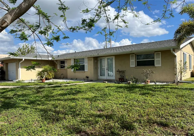 Photo 1 of Single family home for sale at 705 Crestview Cir Nw, Port Charlotte, FL 33948 | MLS# C7507930 | Listing updated on 2026-01-09