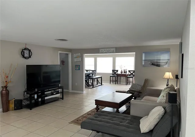 Photo 2 of Single family home for sale at 705 Crestview Cir Nw, Port Charlotte, FL 33948 | MLS# C7507930 | Listing updated on 2026-01-09