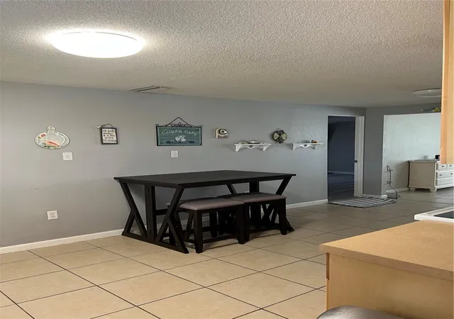 Photo 3 of Single family home for sale at 705 Crestview Cir NW, Port Charlotte, FL 33948 | MLS# C7507930 | Listing updated on 2026-01-09