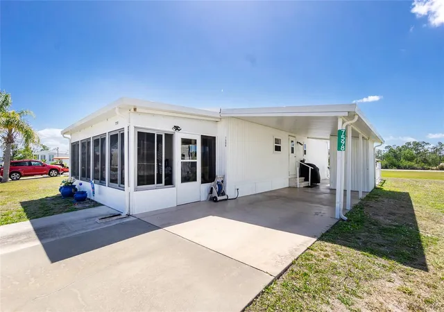 Photo 1 of Manufactured home for sale at 7598 Ratan Cir, Port Charlotte, FL 33981 | MLS# C7508153 | Listing updated on 2026-10-13