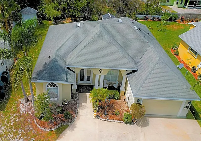 3rd image of 35 Frontier Dr, Palm Coast, FL 32137 | MLS# O6297154