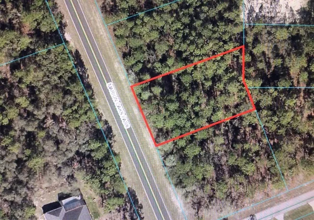 Photo 1 of Land for sale at 0 Sw Marion Oaks Pass, Ocala, FL 34473 | MLS# OM698810 | Listing updated on 2026-04-21