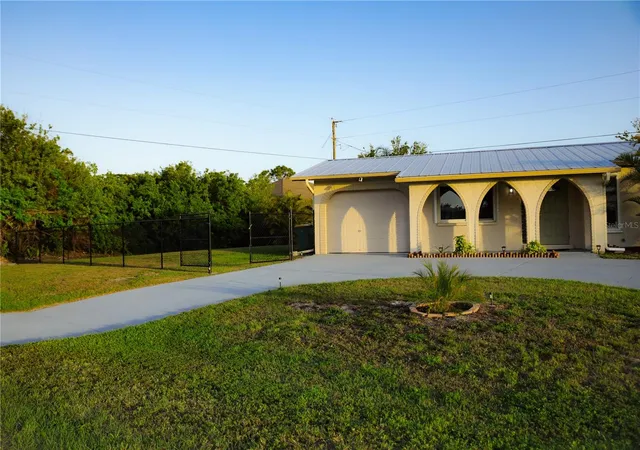 Photo 2 of Single family home for sale at 389 Millport St Nw, Port Charlotte, FL 33948 | MLS# A4647971 | Listing updated on 2026-09-05