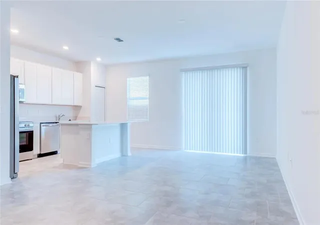 Photo 3 of Townhouse for sale at 3239 Laurent Loop, Davenport, FL 33837 | MLS# O6297956 | Listing updated on 2026-10-14