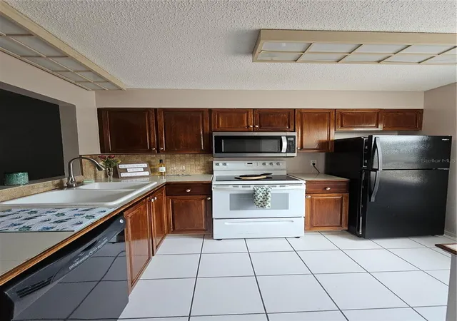 Photo 3 of Condo for sale at 13813 Mission Oaks Blvd, Seminole, FL 33776 | MLS# TB8372105 | Listing updated on 2026-10-05