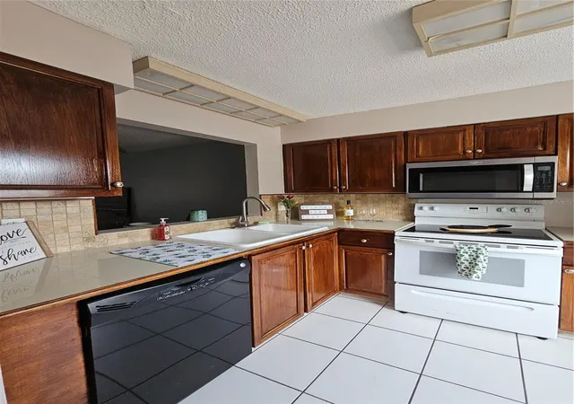 Photo 4 of Condo for sale at 13813 Mission Oaks Blvd, Seminole, FL 33776 | MLS# TB8372105 | Listing updated on 2026-10-05