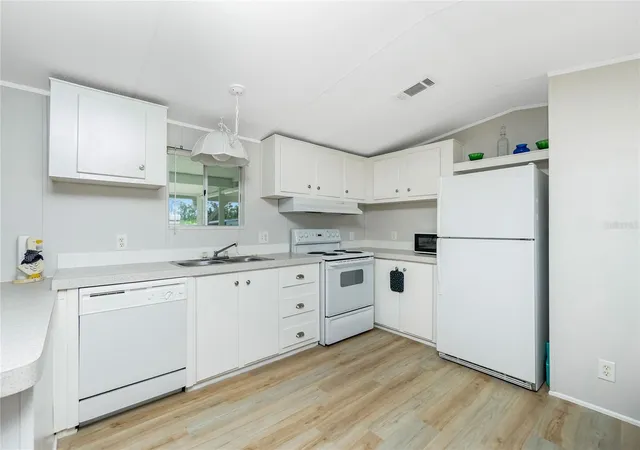 Photo 2 of Manufactured home for sale at 7364 Tisa Ave, Port Charlotte, FL 33981 | MLS# C7508382 | Listing updated on 2026-06-20