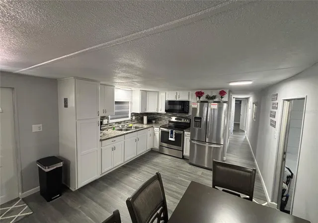 Photo 3 of Manufactured home for sale at 6141 Sw 57Th Ct, Ocala, FL 34474 | MLS# OM699195 | Listing updated on 2026-10-01
