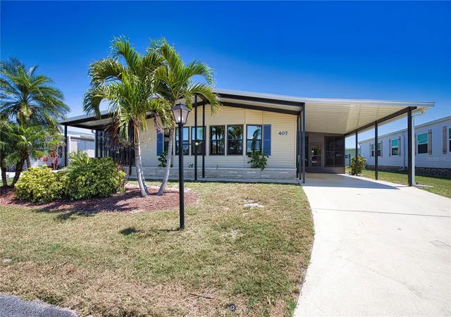Photo 2 of Manufactured home for sale at 407 Madonna, North Port, FL 34287 | MLS# TB8373465 | Listing updated on 2026-09-22