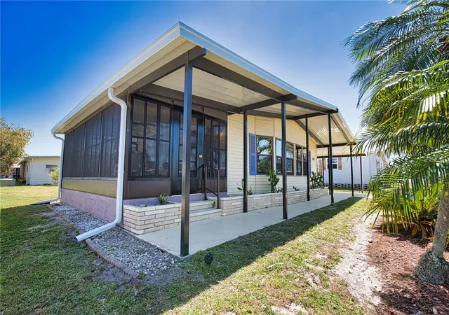 Photo 3 of Manufactured home for sale at 407 Madonna, North Port, FL 34287 | MLS# TB8373465 | Listing updated on 2026-09-22