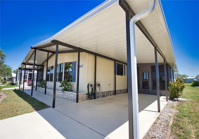 Photo 3 of Manufactured home for sale at 407 Madonna, North Port, FL 34287 | MLS# TB8373465 | Listing updated on 2026-09-22