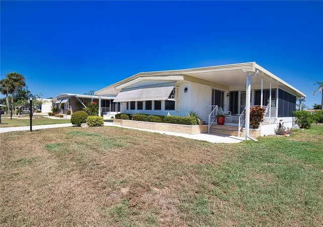 Photo 4 of Manufactured home for sale at 108 La Paloma, North Port, FL 34287 | MLS# TB8373530 | Listing updated on 2026-09-23