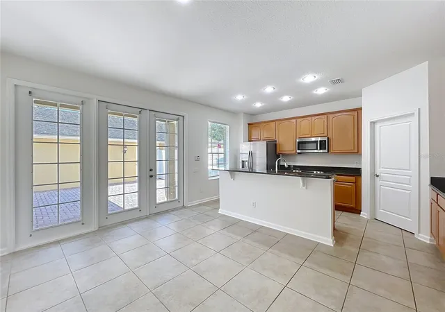 Photo 4 of Townhouse for sale at 12930 Vennetta Way, Windermere, FL 34786 | MLS# O6301208 | Listing updated on 2026-09-23