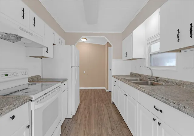 4th image of 11309 Leisure Ln, Port Richey, FL 34668 | MLS# TB8378497