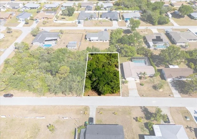 Photo 1 of Land for sale at 868 Mensh Ter Nw, Port Charlotte, FL 33948 | MLS# C7509314 | Listing updated on 2026-04-30