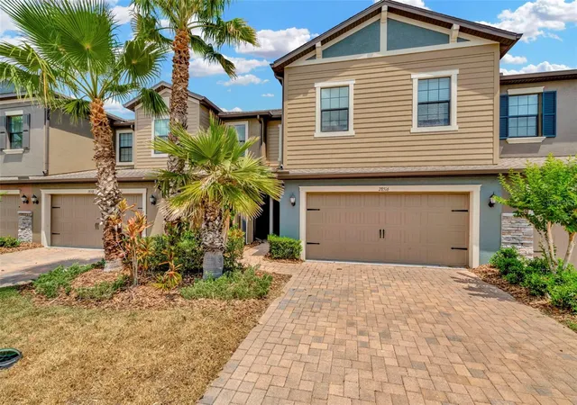 Photo 1 of Townhouse for sale at 28516 Tranquil Lake Cir, Wesley Chapel, FL 33543 | MLS# TB8380852 | Listing updated on 2026-08-24