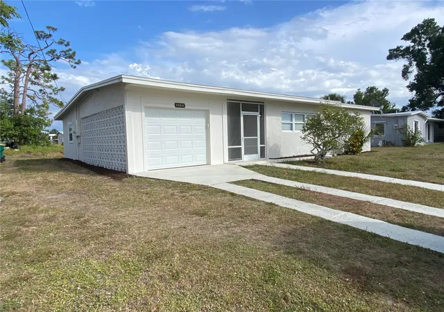 Photo 1 of Single family home for sale at 22011 Catherine Ave, Port Charlotte, FL 33952 | MLS# O6305908 | Listing updated on 2026-10-20