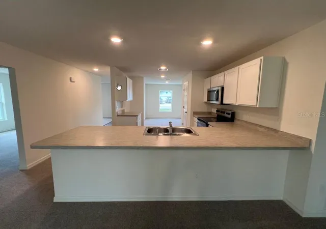 3rd image of 76 Raleigh Dr, Palm Coast, FL 32164 | MLS# C7509629