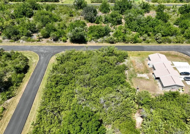 Photo 1 of Land for sale at 12204 Kirk Ave, Port Charlotte, FL 33981 | MLS# O6307649 | Listing updated on 2026-05-26