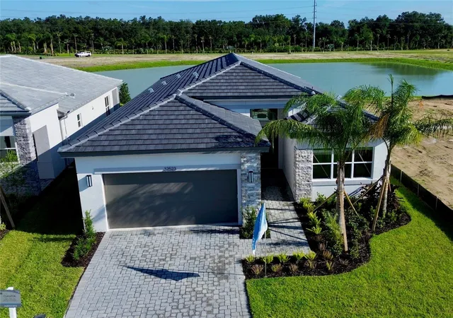 Photo 1 of Single family home for sale at 32523 Neroli St, Wesley Chapel, FL 33543 | MLS# TB8384851 | Listing updated on 2026-08-28