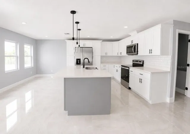 Photo 2 of Single family home for sale at 3704 Smith Tree St, Tampa, FL 33619 | MLS# TB8384958 | Listing updated on 2026-08-09