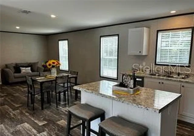 Photo 1 of Manufactured home for sale at 9494 SE 144th Place, Summerfield, FL 34491 | MLS# TB8388219 | Listing updated on 2026-04-13