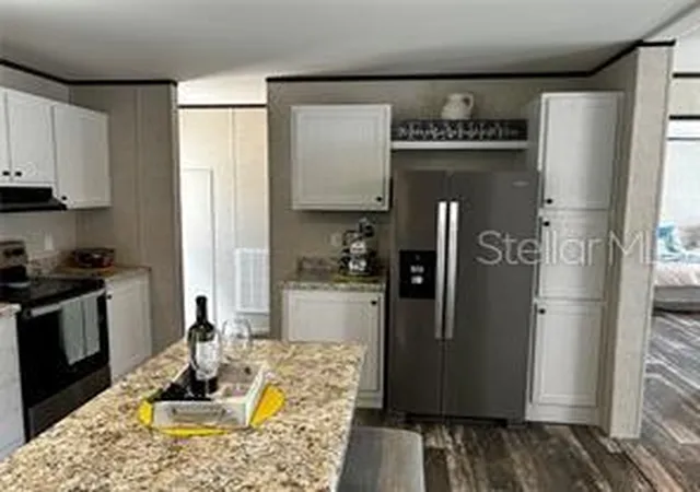 Photo 3 of Manufactured home for sale at 9494 SE 144th Place, Summerfield, FL 34491 | MLS# TB8388219 | Listing updated on 2026-04-13