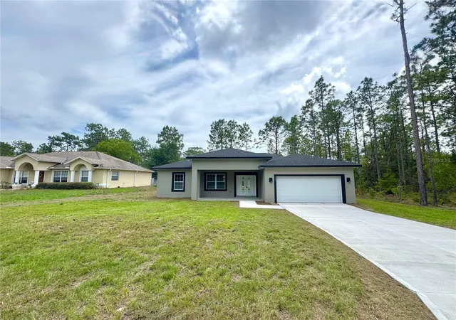 Photo 2 of Single family home for sale at 628 W Heronsbill Ln, Dunnellon, FL 34434 | MLS# O6312951 | Listing updated on 2026-08-11